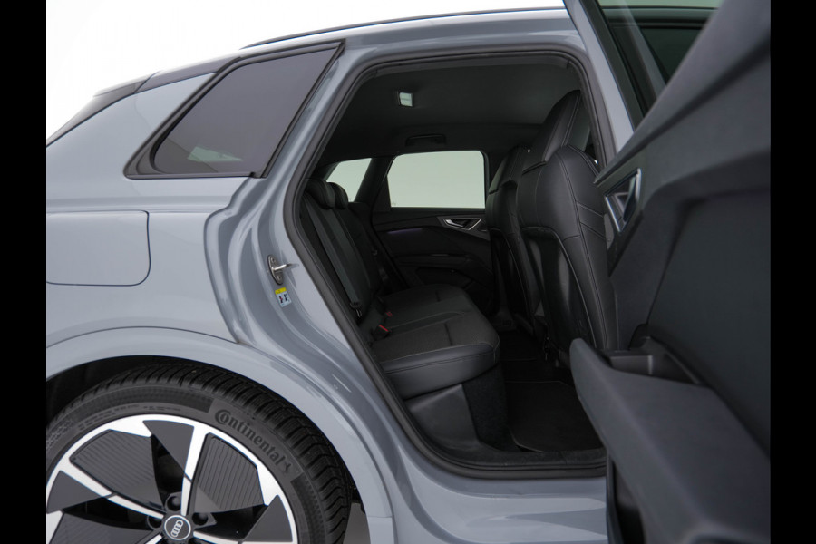 Audi Q4 e-tron 40 Launch edition S Competition 77 kWh [ 3-Fase ] {SOH-93%} (INCL-BTW) *HEATPUMP | LEATHER-FABRIC | MATRIX-LED | ADAPTIVE-CRUISE | HEATED-SPORTSEATS | AMBIENTLIGHT | DIGI-COCKPIT | CAMERA | KEYLESS | DAB+ | NAVI-FULLMAP | TOWBAR | PRIVACYGLASS | 21"AL