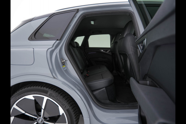 Audi Q4 e-tron 40 Launch edition S Competition 77 kWh [ 3-Fase ] {SOH-93%} (INCL-BTW) *HEATPUMP | LEATHER-FABRIC | MATRIX-LED | ADAPTIVE-CRUISE | HEATED-SPORTSEATS | AMBIENTLIGHT | DIGI-COCKPIT | CAMERA | KEYLESS | DAB+ | NAVI-FULLMAP | TOWBAR | PRIVACYGLASS | 21"AL