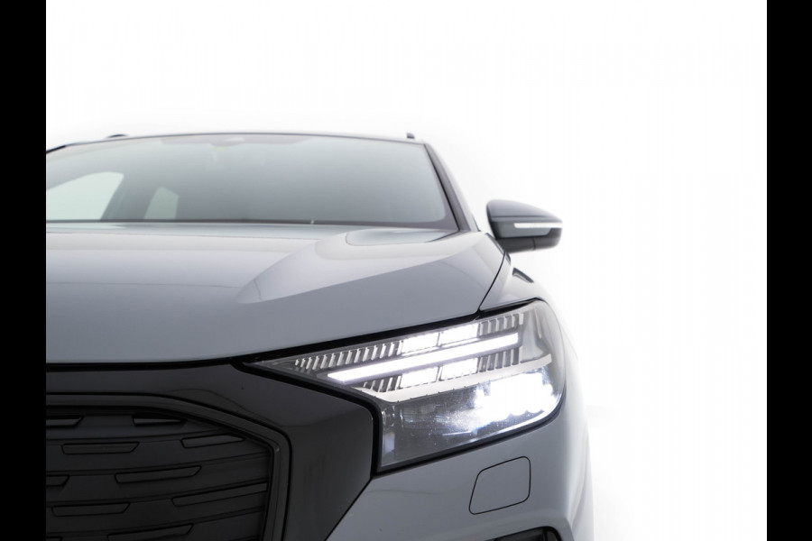 Audi Q4 e-tron 40 Launch edition S Competition 77 kWh [ 3-Fase ] {SOH-93%} (INCL-BTW) *HEATPUMP | LEATHER-FABRIC | MATRIX-LED | ADAPTIVE-CRUISE | HEATED-SPORTSEATS | AMBIENTLIGHT | DIGI-COCKPIT | CAMERA | KEYLESS | DAB+ | NAVI-FULLMAP | TOWBAR | PRIVACYGLASS | 21"AL