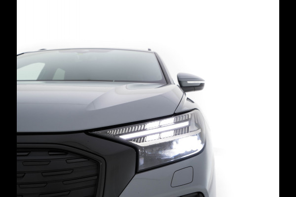 Audi Q4 e-tron 40 Launch edition S Competition 77 kWh [ 3-Fase ] {SOH-93%} (INCL-BTW) *HEATPUMP | LEATHER-FABRIC | MATRIX-LED | ADAPTIVE-CRUISE | HEATED-SPORTSEATS | AMBIENTLIGHT | DIGI-COCKPIT | CAMERA | KEYLESS | DAB+ | NAVI-FULLMAP | TOWBAR | PRIVACYGLASS | 21"AL