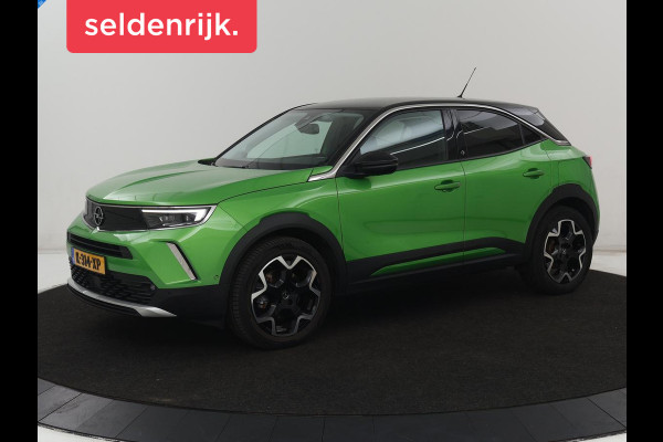 Opel Mokka-e Ultimate 50 kWh | SOH 90% | 3 Fase | Stoelverwarming | Leder/Alcantara | Warmtepomp | Adaptive cruise | Camera | Stuurverwarming | Carplay | Matrix LED | Navigatie | Park Assist