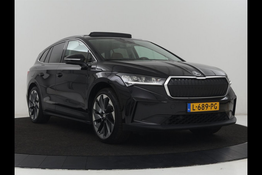 Škoda ENYAQ iV 80 | SOH 91% | Panoramadak | Trekhaak | Leder | Stoelverwarming | Camera | Sfeerverlichting | Navigatie | Carplay | Cruise control | Full LED | Keyless | Getint glas