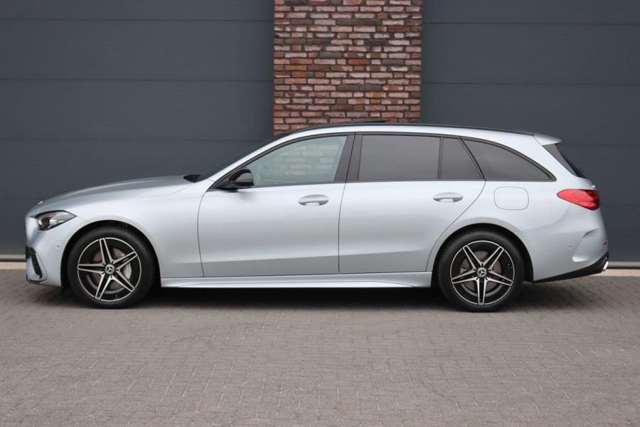 Mercedes-Benz C-Klasse Estate 300 e AMG Line Aut9 | Panoramadak | Trekhaak | Leder | Camera | Sfeerverlichting | Dodehoekassistent | Stoelverwarming | Advanced Sound System | High Perf. LED |