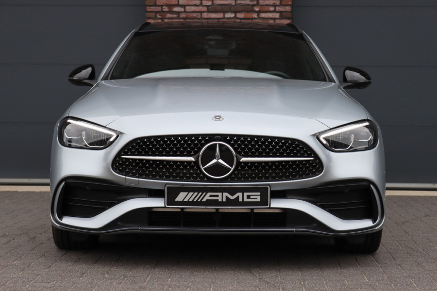 Mercedes-Benz C-Klasse Estate 300 e AMG Line Aut9 | Panoramadak | Trekhaak | Leder | Camera | Sfeerverlichting | Dodehoekassistent | Stoelverwarming | Advanced Sound System | High Perf. LED |