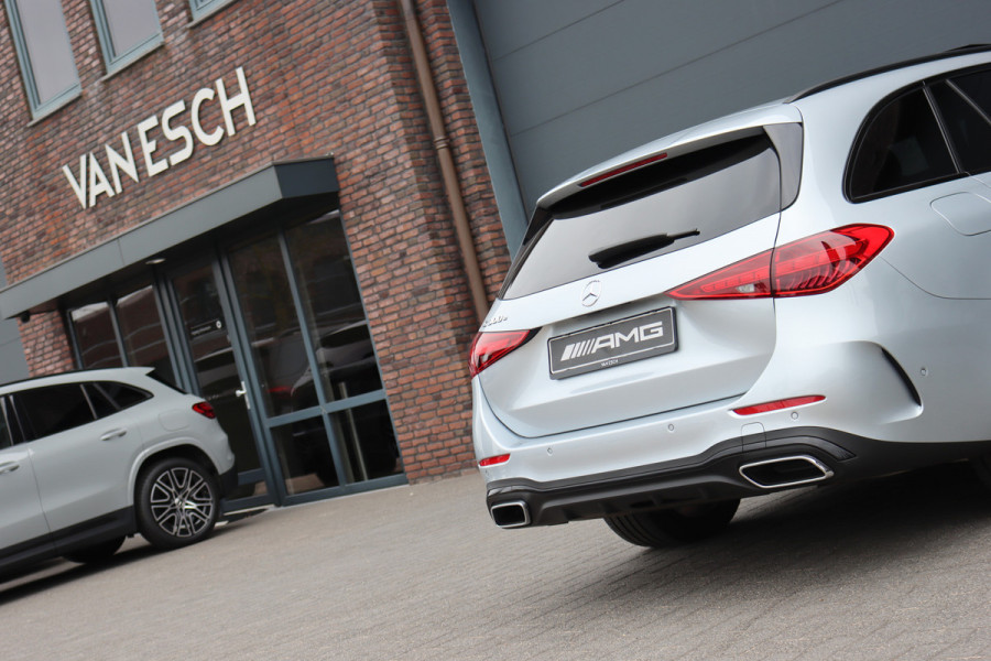 Mercedes-Benz C-Klasse Estate 300 e AMG Line Aut9 | Panoramadak | Trekhaak | Leder | Camera | Sfeerverlichting | Dodehoekassistent | Stoelverwarming | Advanced Sound System | High Perf. LED |