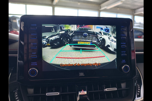 Toyota Corolla 2.0I 184 PK Hybride AUT. Trekhaak Pano-Dak Camera Adaptive-Cruise Apple Carplay Android Stoel+Stuurverwarming Navi* Ecc JBL®-Aud Led Privacy Glas Lane Assist Regen-Lichtsensor Keyless Voorruit Verwarmbaar Dodehoekdetectie Zeer compleet!