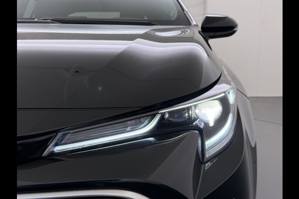 Toyota Corolla 2.0I 184 PK Hybride AUT. Trekhaak Pano-Dak Camera Adaptive-Cruise Apple Carplay Android Stoel+Stuurverwarming Navi* Ecc JBL®-Aud Led Privacy Glas Lane Assist Regen-Lichtsensor Keyless Voorruit Verwarmbaar Dodehoekdetectie Zeer compleet!
