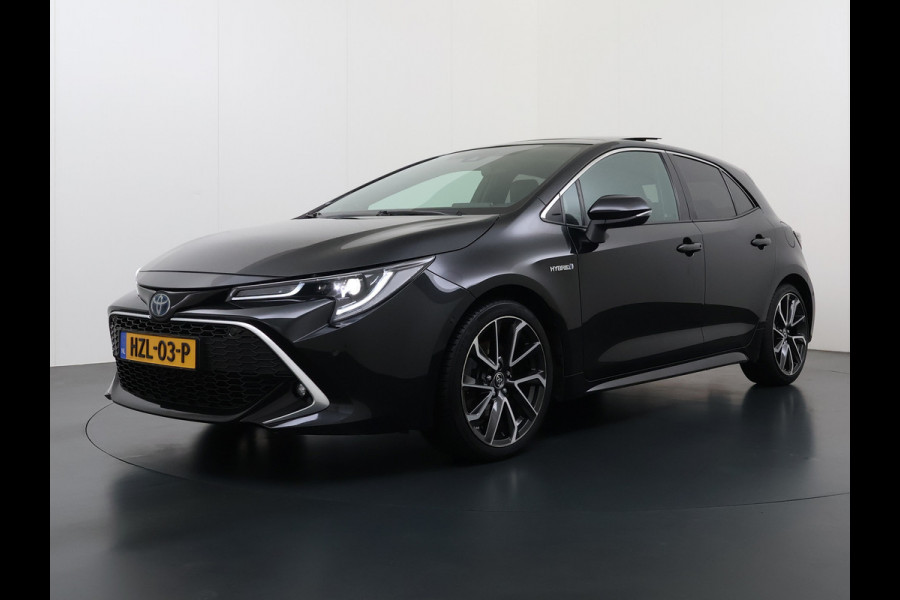 Toyota Corolla 2.0I 184 PK Hybride AUT. Trekhaak Pano-Dak Camera Adaptive-Cruise Apple Carplay Android Stoel+Stuurverwarming Navi* Ecc JBL®-Aud Led Privacy Glas Lane Assist Regen-Lichtsensor Keyless Voorruit Verwarmbaar Dodehoekdetectie Zeer compleet!