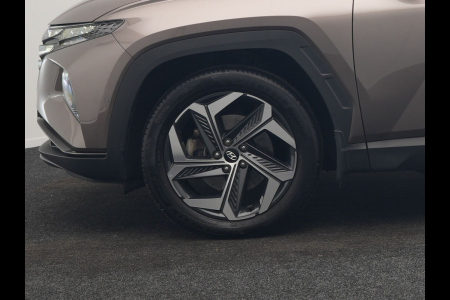 Hyundai Tucson 1.6 T-GDI Premium 4WD PHEV 265pk Dealer O.H. | Trekhaak Afn. | Adaptive Cruise | 360 Camera | Krell Premium Sound | Lederen Sportstoelen Memory & Ventilatie | Keyless | Apple Carplay | Stoelen & Stuur Verwarmd | Navigatie | DAB | Plug In Hybrid