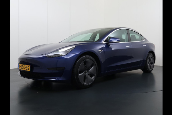 Tesla Model 3 SR+ 325PK LFP-Accu AutoPilot Leer Pano-Dak Adaptive Cruise Lmv 18" Camera's Elektr.-Stuur+Stoelen+Spiegels+Geheugen+Easy-Entry+V SOH 90% Ecc Navi Led DAB Voorverwarmen interieur via App Keyless One-Pedal-Drive Origineel Nederlandse Auto Slechts 26.700km!