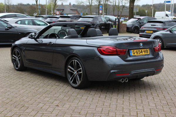 BMW 4 Serie Cabrio 420i High Executive Ed. M Sport / Camera / Leder / Harman Kardon / Nekverwarming / 19'' / Navigatie / Windscherm / DAB / Stoelverwarming / Cruise Control