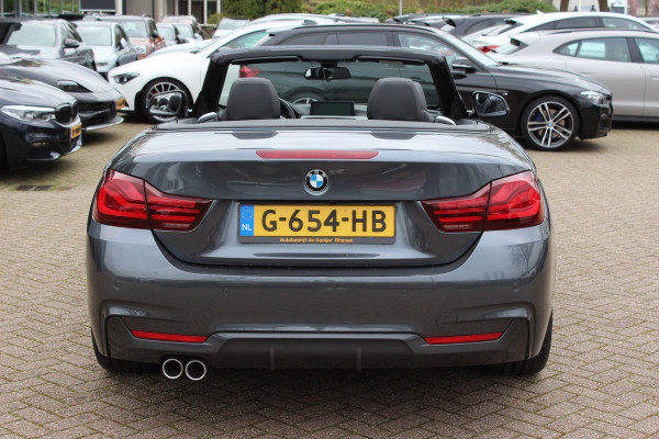 BMW 4 Serie Cabrio 420i High Executive Ed. M Sport / Camera / Leder / Harman Kardon / Nekverwarming / 19'' / Navigatie / Windscherm / DAB / Stoelverwarming / Cruise Control