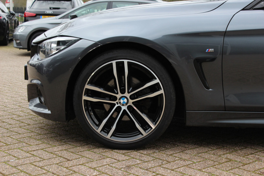 BMW 4 Serie Cabrio 420i High Executive Ed. M Sport / Camera / Leder / Harman Kardon / Nekverwarming / 19'' / Navigatie / Windscherm / DAB / Stoelverwarming / Cruise Control