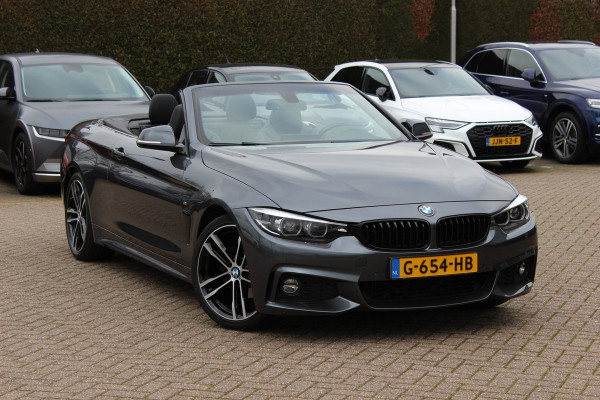 BMW 4 Serie Cabrio 420i High Executive Ed. M Sport / Camera / Leder / Harman Kardon / Nekverwarming / 19'' / Navigatie / Windscherm / DAB / Stoelverwarming / Cruise Control
