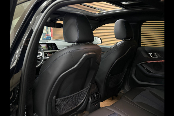 BMW 1-serie M135i xDrive M-Performance | BomVOL! | M-Technic | Pano | HuD | Parkeer-pakket | Ambient | Shadow-Line | DealerOH