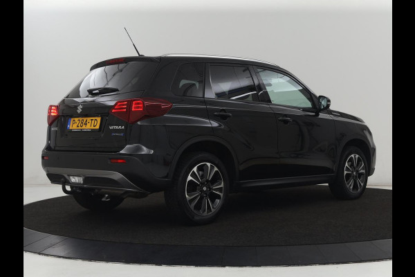 Suzuki Vitara 1.5 Hybrid Style | Trekhaak | Stoelverwarming | Adaptive cruise | Camera | Carplay | Leder/Alcantara | Full LED | Keyless | Navigatie | Climate control | Parkeerhulp