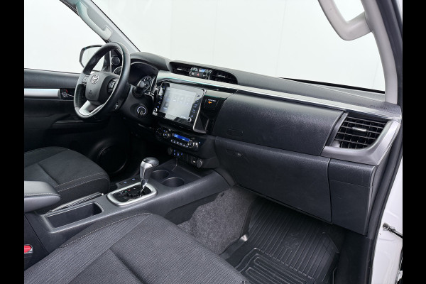 Toyota Hilux 2.4 D-4D 4WD AUT-6 Double Cab Professional Lier Canopy Hardtop (Huif) Trekhaak Navi* via Apple Carplay Android Auto Ecc Camera A Lane Assist Inbouw Kasten Bluetooth AWD EURO6 400Nm *3.500kg Trekvermogen* 1e Eigenaar Dealeronderhouden Origineel Nederlandse Auto