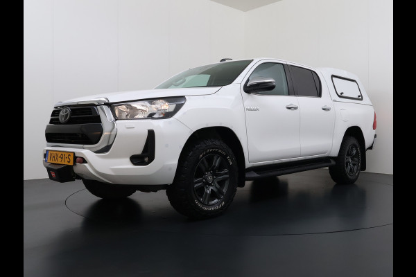 Toyota Hilux 2.4 D-4D 4WD AUT-6 Double Cab Professional Lier Canopy Hardtop (Huif) Trekhaak Navi* via Apple Carplay Android Auto Ecc Camera A Lane Assist Inbouw Kasten Bluetooth AWD EURO6 400Nm *3.500kg Trekvermogen* 1e Eigenaar Dealeronderhouden Origineel Nederlandse Auto