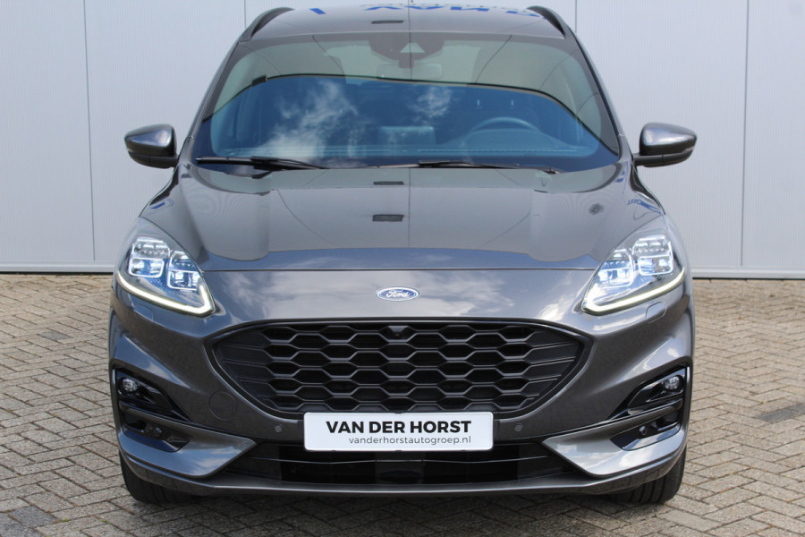 Ford Kuga 2.5-225pk Plug-in Hybrid ST-Line X. Hybride rijden voor een reële prijs ! Autm. airco dual, side- en lane assist, adaptieve cruise cntrl, camera v+a, stoel- en voorraamverw., elektr. achterklep, metallic lak, navigatie, telefoonvoorb.