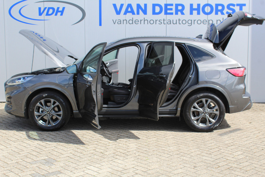 Ford Kuga 2.5-225pk Plug-in Hybrid ST-Line X. Hybride rijden voor een reële prijs ! Autm. airco dual, side- en lane assist, adaptieve cruise cntrl, camera v+a, stoel- en voorraamverw., elektr. achterklep, metallic lak, navigatie, telefoonvoorb.