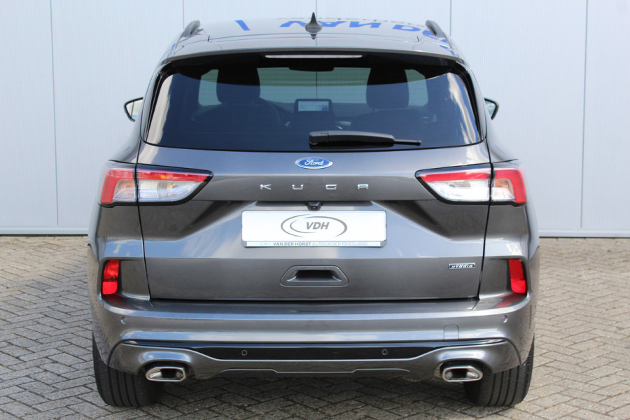 Ford Kuga 2.5-225pk Plug-in Hybrid ST-Line X. Hybride rijden voor een reële prijs ! Autm. airco dual, side- en lane assist, adaptieve cruise cntrl, camera v+a, stoel- en voorraamverw., elektr. achterklep, metallic lak, navigatie, telefoonvoorb.