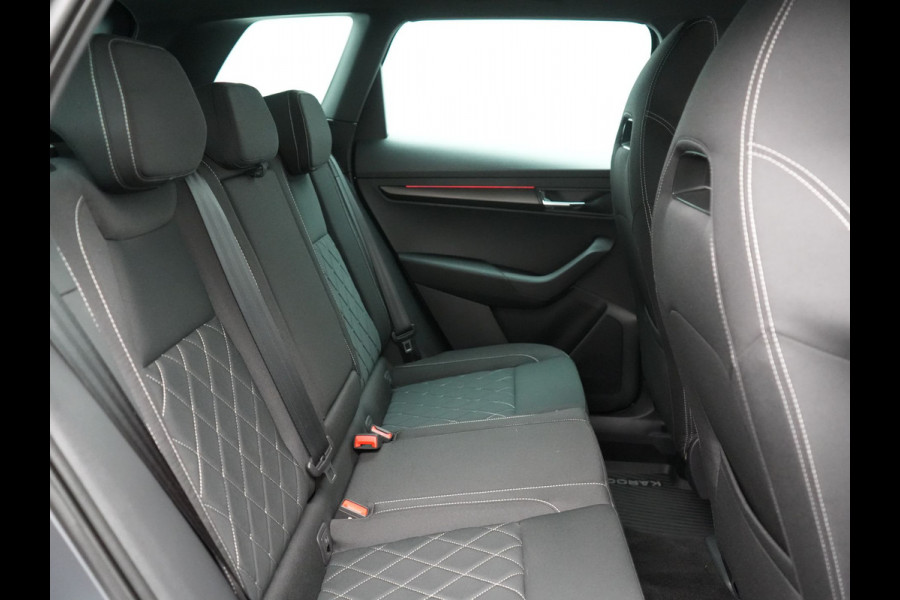 Škoda Karoq 1.5 TSI ACT Sportline Business FACELIFT MODEL DSG 150pk | Adaptive Cruise | Camera | Matrix LED | RS Sportstoelen Verwarmd | 18"L.M | Adaptive Onderstel | Keyless | Sfeerverlichting | Apple Carplay | Virtual | Navigatie | DAB |
