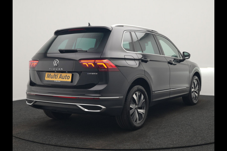 Volkswagen Tiguan 1.4 TSI eHybrid Elegance PHEV 245pk Dealer O.H | Panodak | Adaptive Cruise | 360 Camera | IQ Light | Alcantara Comforstoelen Massage & Verwarmd | Keyless | Apple Carplay | IQ Drive | Navigatie | Virtual | DAB | 18"L.M | Plug In Hybrid