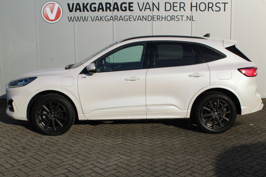Ford Kuga 2.5-225pk Plug-in Hybrid ST-Line X. Hybride rijden voor een reële prijs ! Autm. airco dual, side- en lane assist, adaptieve cruise cntrl, camera v+a, stoel-, stuur- en voorraamverw., elektr. achterklep, metallic lak, navigatie, telefoonvoorb. etc.