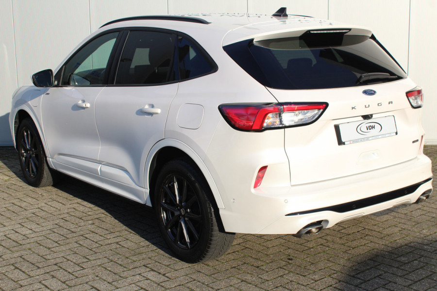 Ford Kuga 2.5-225pk Plug-in Hybrid ST-Line X. Hybride rijden voor een reële prijs ! Autm. airco dual, side- en lane assist, adaptieve cruise cntrl, camera v+a, stoel-, stuur- en voorraamverw., elektr. achterklep, metallic lak, navigatie, telefoonvoorb. etc.