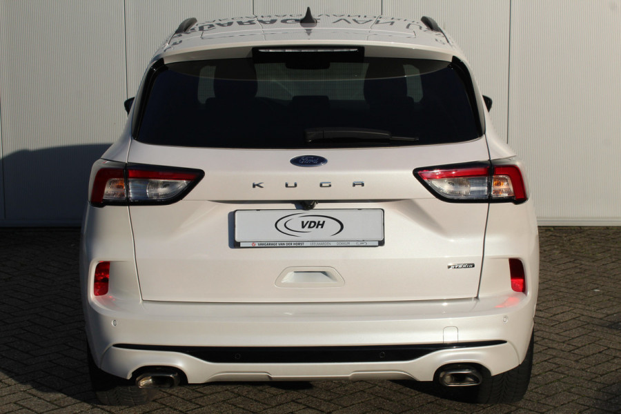 Ford Kuga 2.5-225pk Plug-in Hybrid ST-Line X. Hybride rijden voor een reële prijs ! Autm. airco dual, side- en lane assist, adaptieve cruise cntrl, camera v+a, stoel-, stuur- en voorraamverw., elektr. achterklep, metallic lak, navigatie, telefoonvoorb. etc.