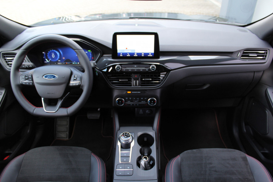 Ford Kuga 2.5-225pk Plug-in Hybrid ST-Line X. Hybride rijden voor een reële prijs ! Autm. airco dual, side- en lane assist, adaptieve cruise cntrl, camera v+a, stoel-, stuur- en voorraamverw., elektr. achterklep, metallic lak, navigatie, telefoonvoorb. etc.