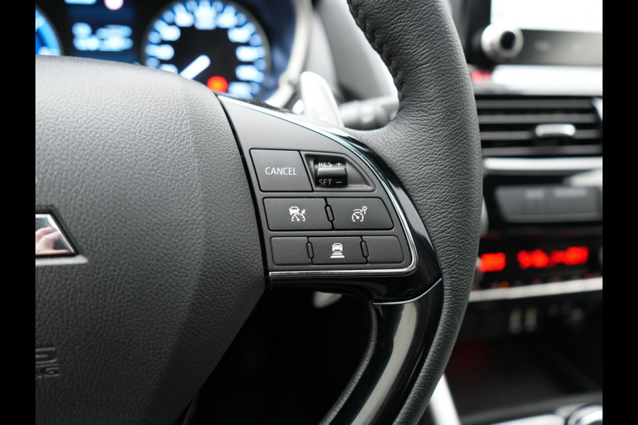 Mitsubishi Eclipse Cross 2.4 Instyle PHEV 188pk Dealer O.H | Trekhaak Afn. | Panodak | Adaptive Cruise | 360 Camera | Lederen Sportstoelen & Stuur Verwarmd | Keyless | Apple Carplay | Blis | Navigatie | Lane Assist | Plug In Hybrid