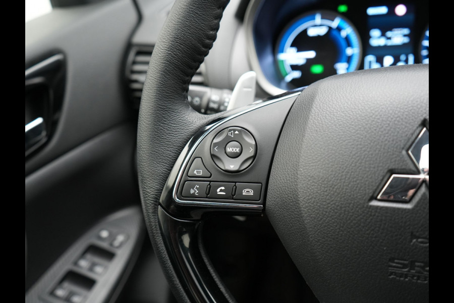 Mitsubishi Eclipse Cross 2.4 Instyle PHEV 188pk Dealer O.H | Trekhaak Afn. | Panodak | Adaptive Cruise | 360 Camera | Lederen Sportstoelen & Stuur Verwarmd | Keyless | Apple Carplay | Blis | Navigatie | Lane Assist | Plug In Hybrid