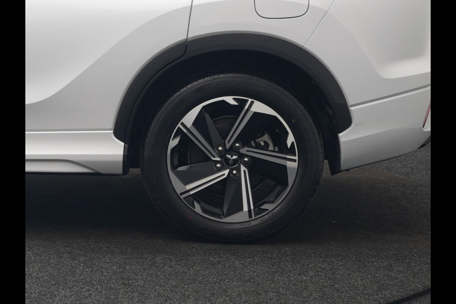 Mitsubishi Eclipse Cross 2.4 Instyle PHEV 188pk Dealer O.H | Trekhaak Afn. | Panodak | Adaptive Cruise | 360 Camera | Lederen Sportstoelen & Stuur Verwarmd | Keyless | Apple Carplay | Blis | Navigatie | Lane Assist | Plug In Hybrid