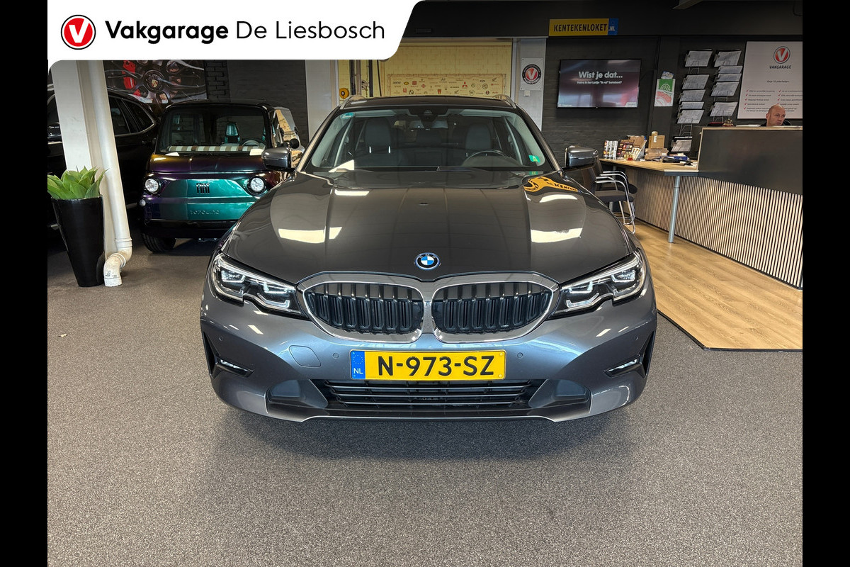 BMW 3 Serie Touring 320e Business Edition Plus,leer,navi,trekhaak,orig ned ,dealer onderhouden