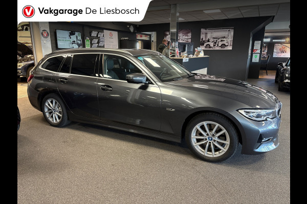 BMW 3 Serie Touring 320e Business Edition Plus,leer,navi,trekhaak,orig ned ,dealer onderhouden