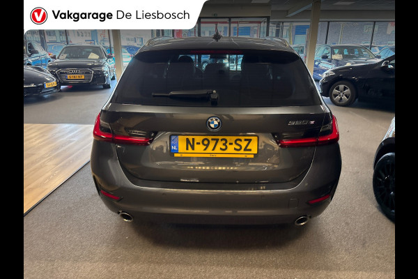 BMW 3 Serie Touring 320e Business Edition Plus,leer,navi,trekhaak,orig ned ,dealer onderhouden