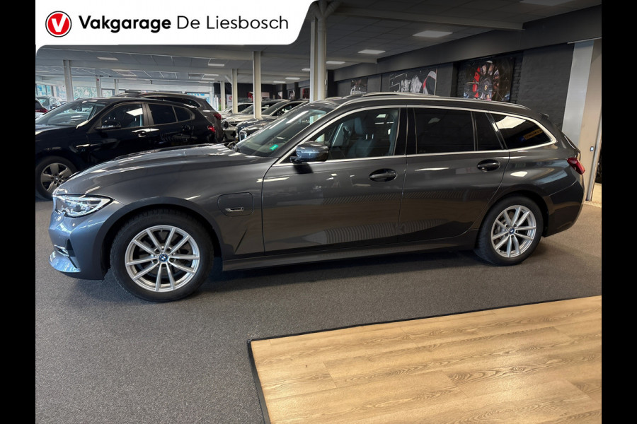 BMW 3 Serie Touring 320e Business Edition Plus,leer,navi,trekhaak,orig ned ,dealer onderhouden