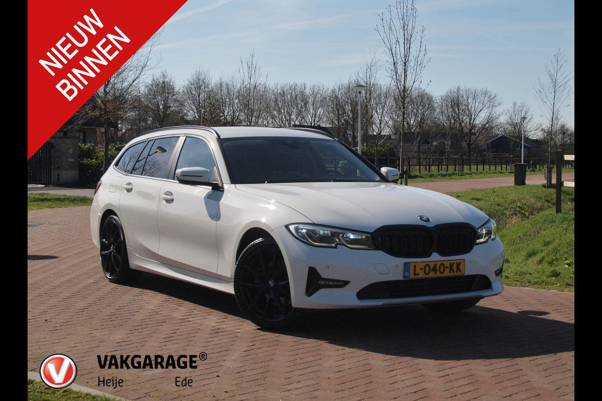 BMW 3 Serie Touring 320e Business Edition Plus | 19 Inch Velgen | Trekhaak | Laser Led koplampen | NL-Auto |