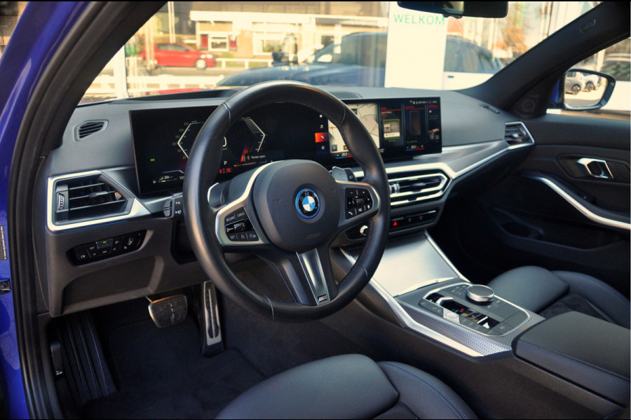 BMW 3 Serie Touring 330e M-Sport | HUD | Trekhaak | Garantie t/m 15-01-2029!