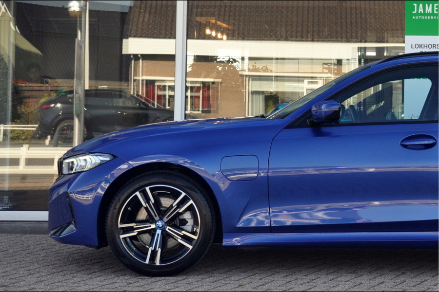 BMW 3 Serie Touring 330e M-Sport | HUD | Trekhaak | Garantie t/m 15-01-2029!