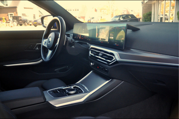 BMW 3 Serie Touring 330e M-Sport | HUD | Trekhaak | Garantie t/m 15-01-2029!
