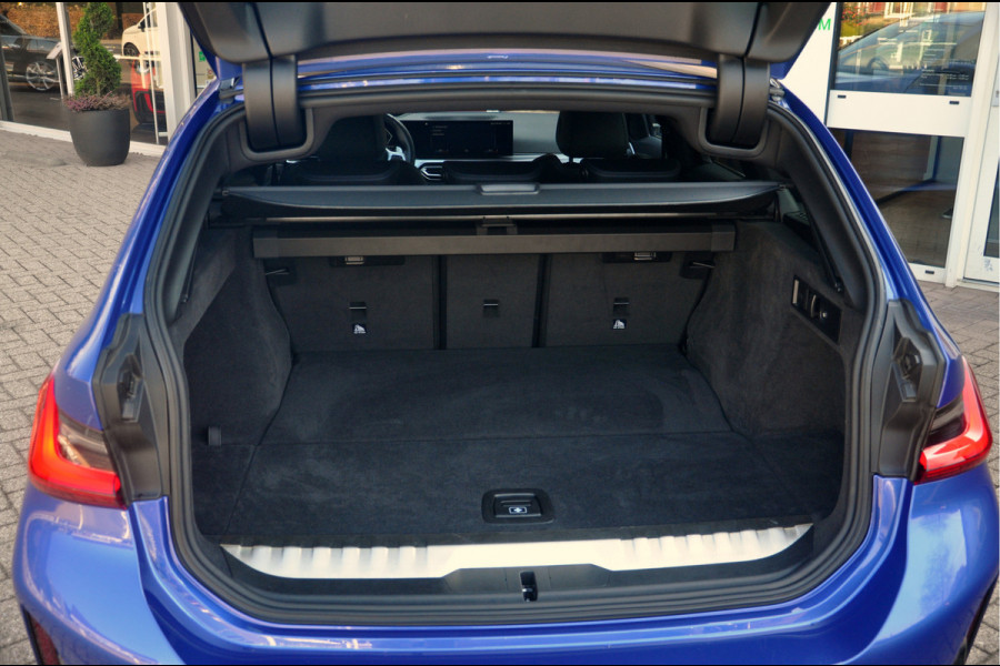 BMW 3 Serie Touring 330e M-Sport | HUD | Trekhaak | Garantie t/m 15-01-2029!