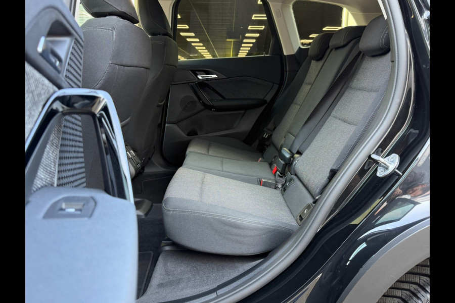 BMW X1 SDrive18i / Navi / Widescreen / Cruise / Climate / Camera / Side assist / Stoelmassage / 18".