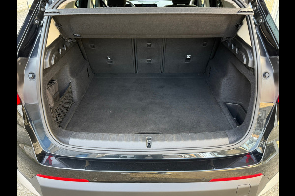 BMW X1 SDrive18i / Navi / Widescreen / Cruise / Climate / Camera / Side assist / Stoelmassage / 18".