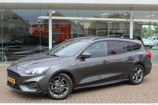 Ford FOCUS Wagon 1.0-125pk EcoBoost ST-Line AUTOMAAT ! Heel erg nette en goed onderhouden Ford Focus ST-Line wagon automaat. Volautm. airco dual, stoel-, stuur- en voorraamverw., camera, trekhaak, navigatie, telefoonvoorb., LM wln, cruise cntrl, skiluik etc., etc....