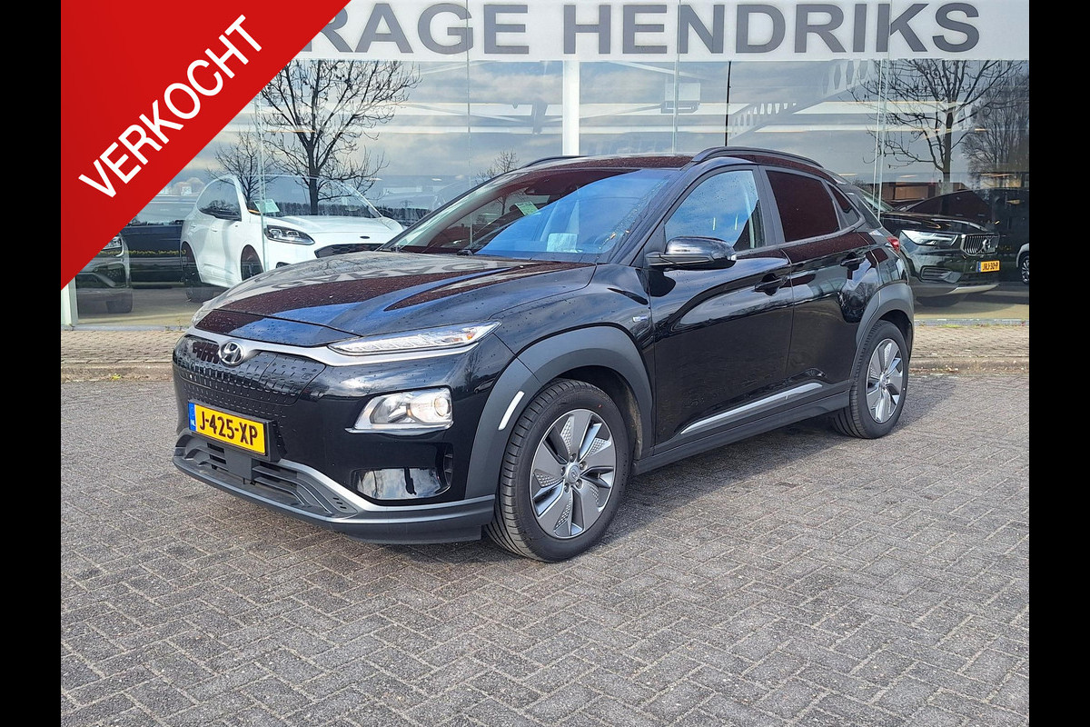 Hyundai Kona EV Fashion 64 kWh | SOH: 95,1% | Trekhaak | 3 Fase | Warmtepomp | HUD | Navi | Adaptive CC | Blindspot |
