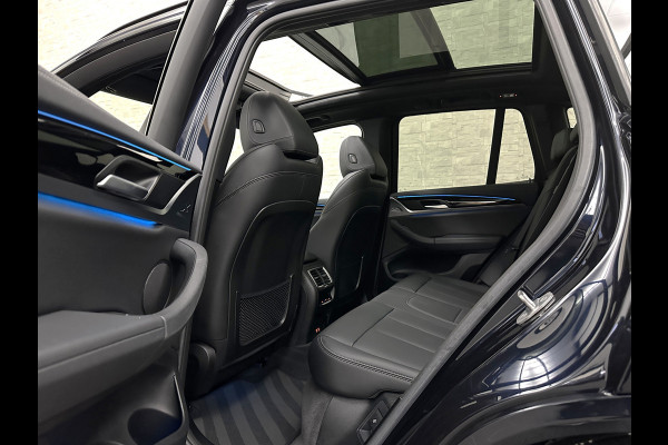 BMW iX3 M-Sport 80 kWh | Panorama | Leder | 99% SOH | ACC | Trekhaak | Memory | Camera | 3-Zone Clima | Carplay | Getint Glas | Black-Optic | Stoelverwarming | Draadloos Laden | Bovag Garantie |