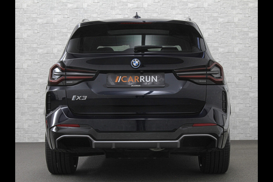 BMW iX3 M-Sport 80 kWh | Panorama | Leder | 99% SOH | ACC | Trekhaak | Memory | Camera | 3-Zone Clima | Carplay | Getint Glas | Black-Optic | Stoelverwarming | Draadloos Laden | Bovag Garantie |