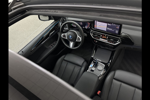 BMW iX3 M-Sport 80 kWh | Panorama | Leder | 99% SOH | ACC | Trekhaak | Memory | Camera | 3-Zone Clima | Carplay | Getint Glas | Black-Optic | Stoelverwarming | Draadloos Laden | Bovag Garantie |